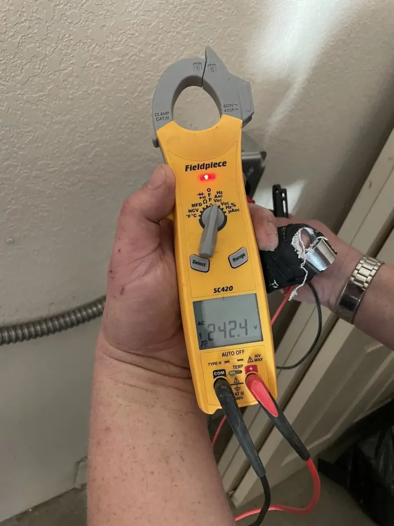 Voltage testing with clamp meter during Circuit Breaker Repair in Madeira